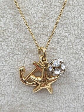 J Crew Gold Tone Delicate Necklace with Starfish, Anchor, Crystal Ball Charms